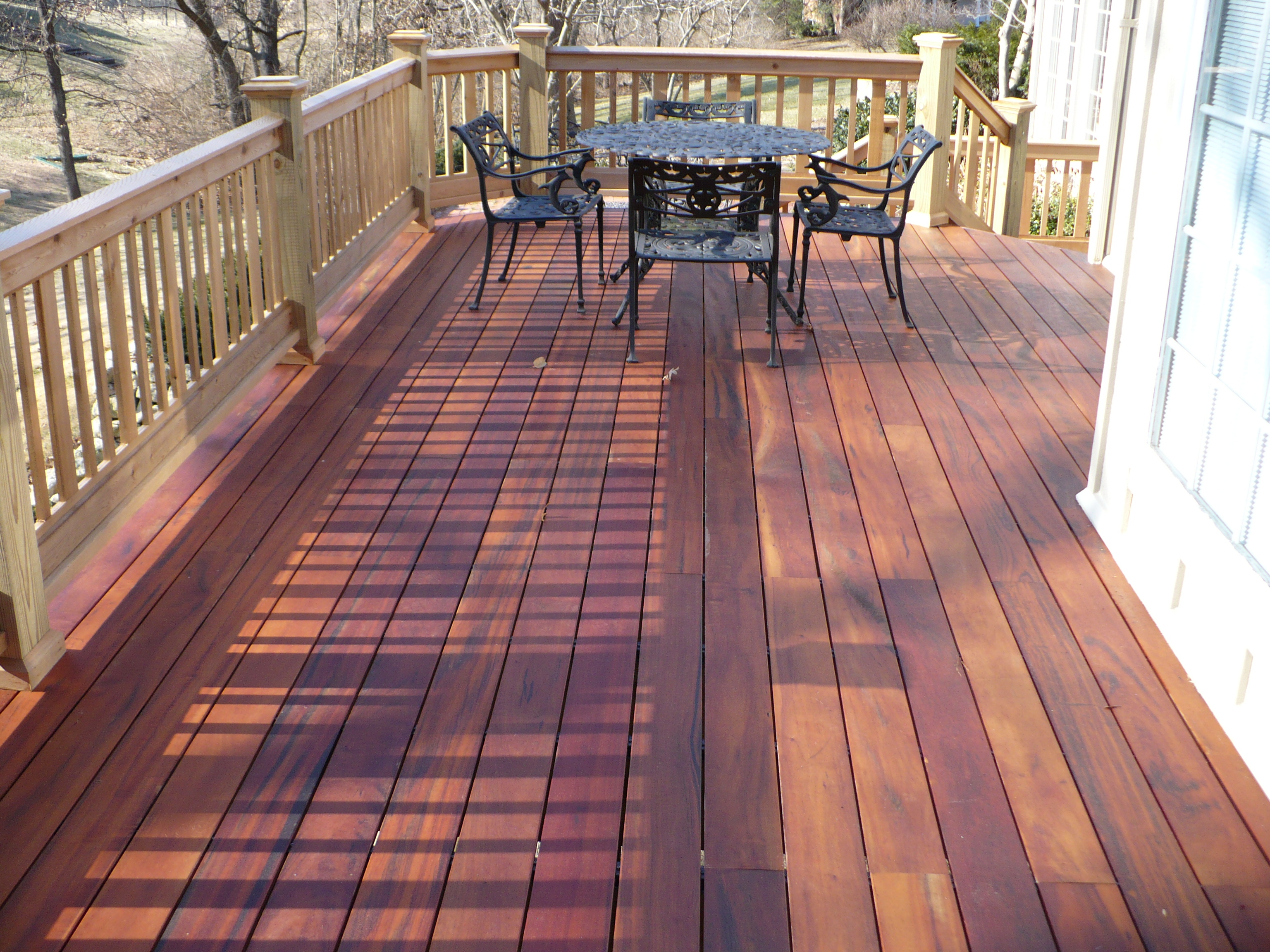 deck with table and chairs
