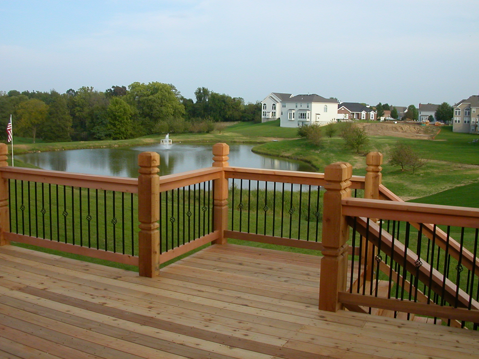 deck with staircase leading down