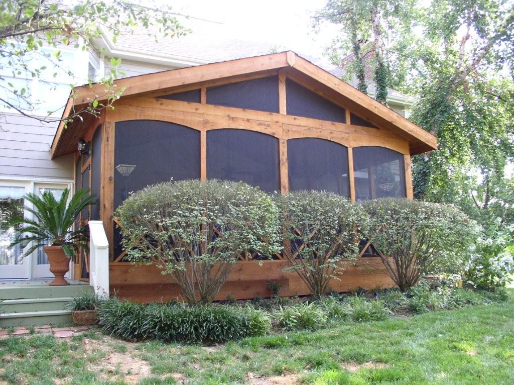 screen room with wood frame