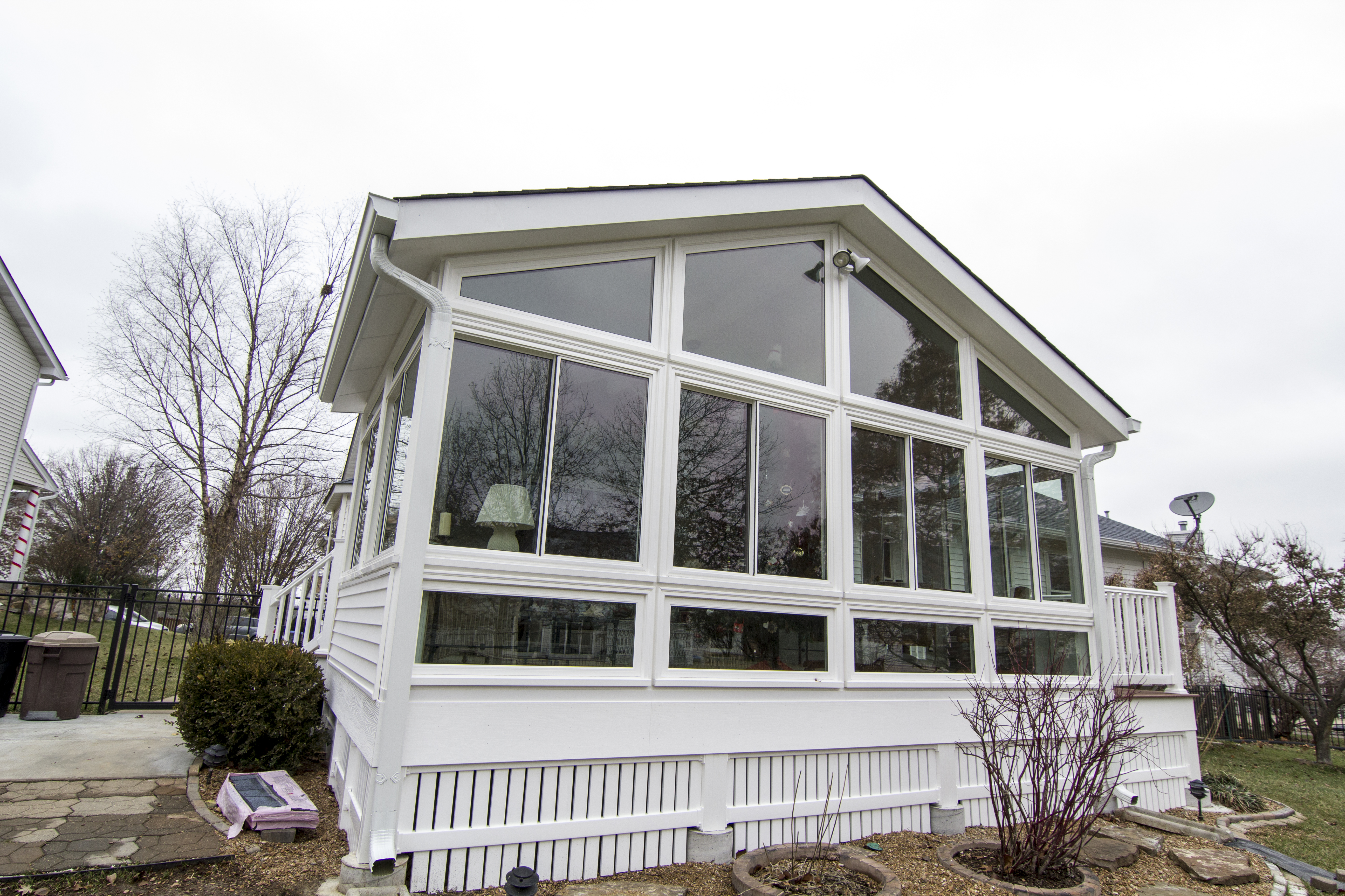 exterior of sunroom with peaked roof