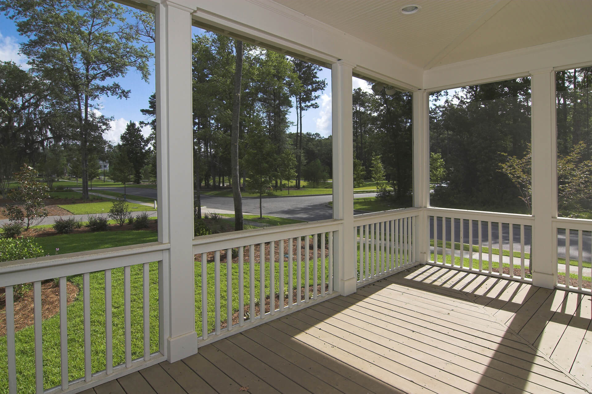 screened-in patio overlooking trees