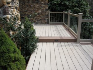 almond-colored vinyl decking on exterior of home