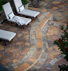 paver patio with different styles of pavers and patio furniture