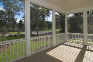 interior of screen room overlooking yard