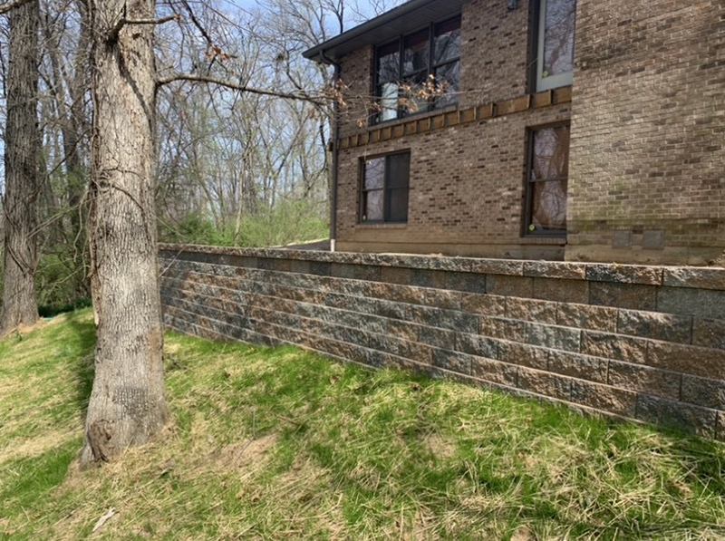 retaining wall below a home