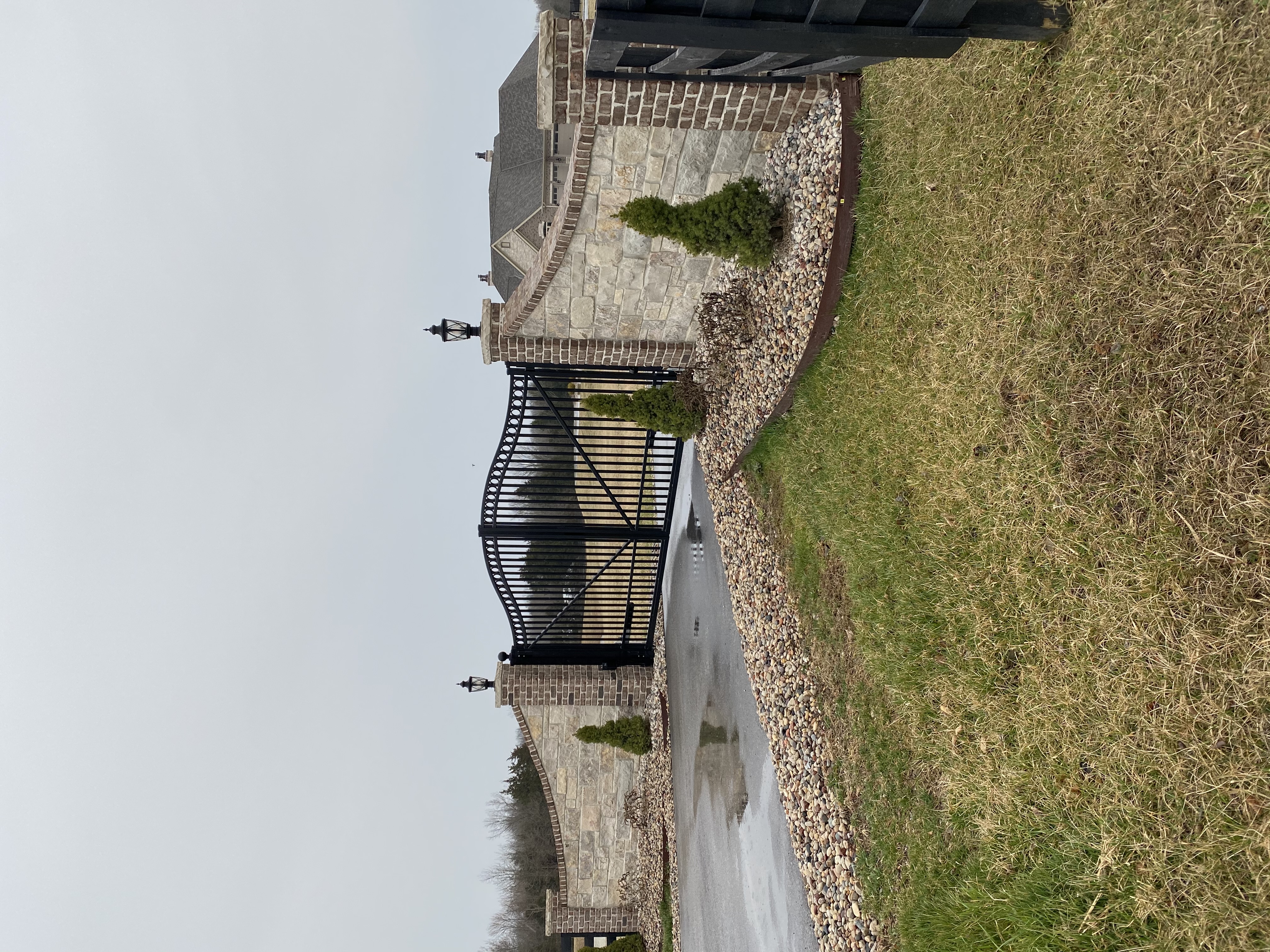 Estate Gate with stone decorative sides