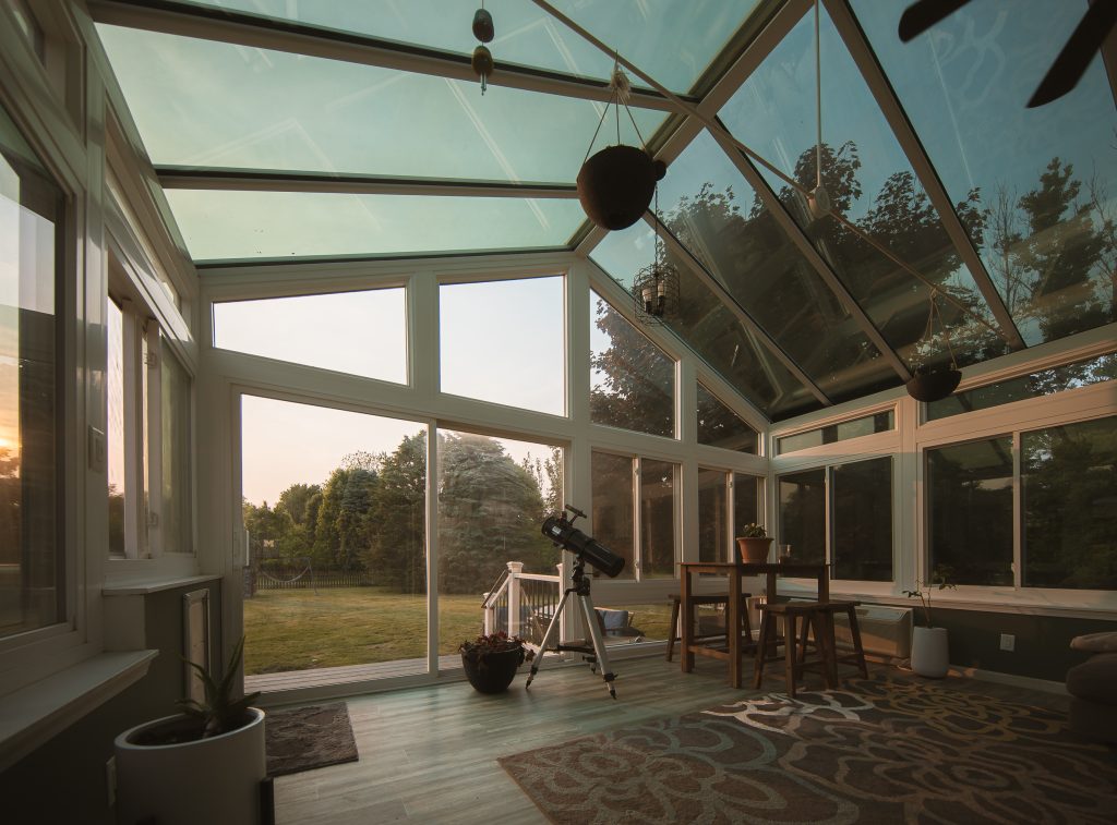 Conservatory sunroom with minimalist design during golden hour in St. Louis MO