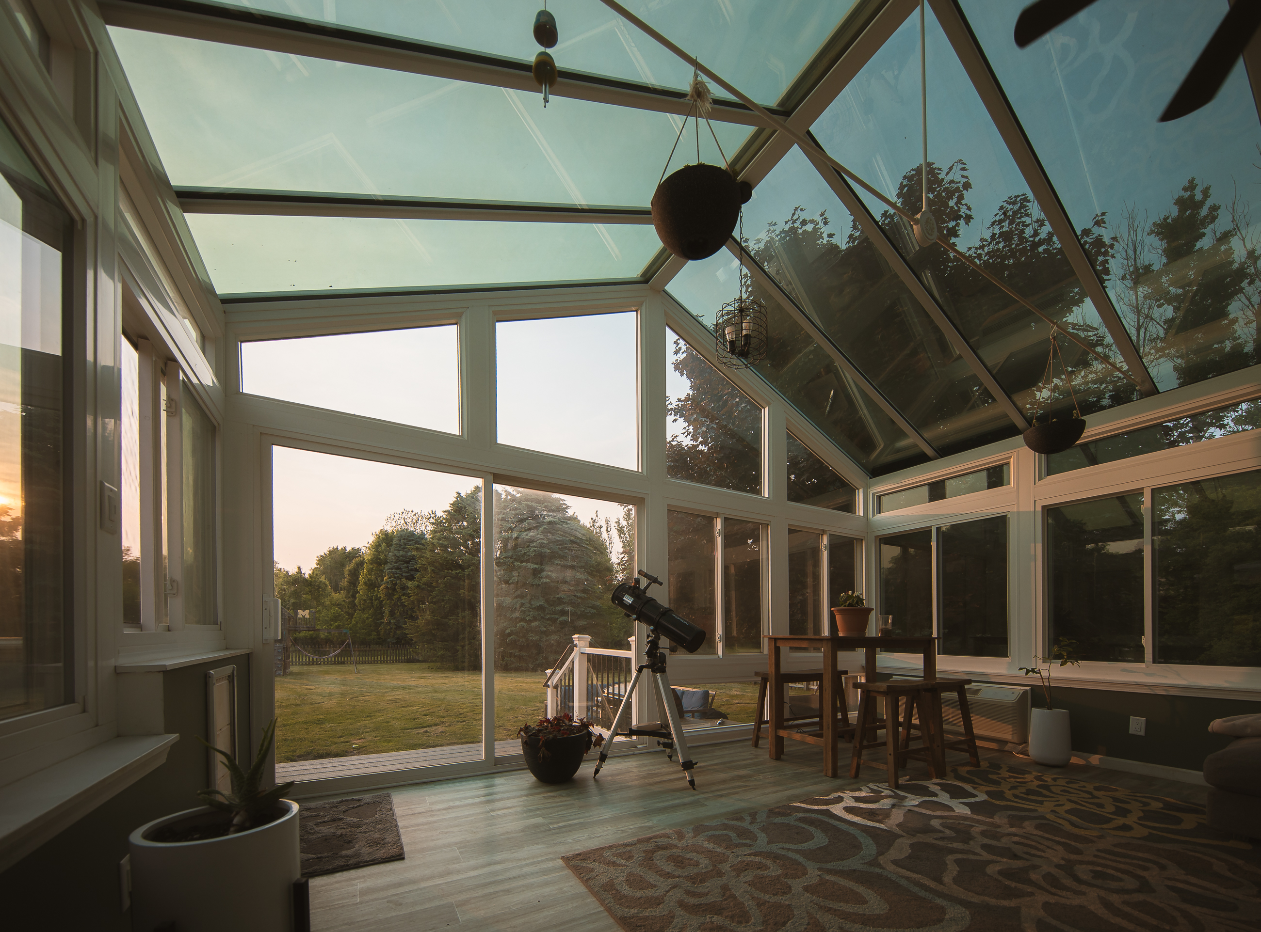 Conservatory sunroom with minimalist design during golden hour in St. Louis MO