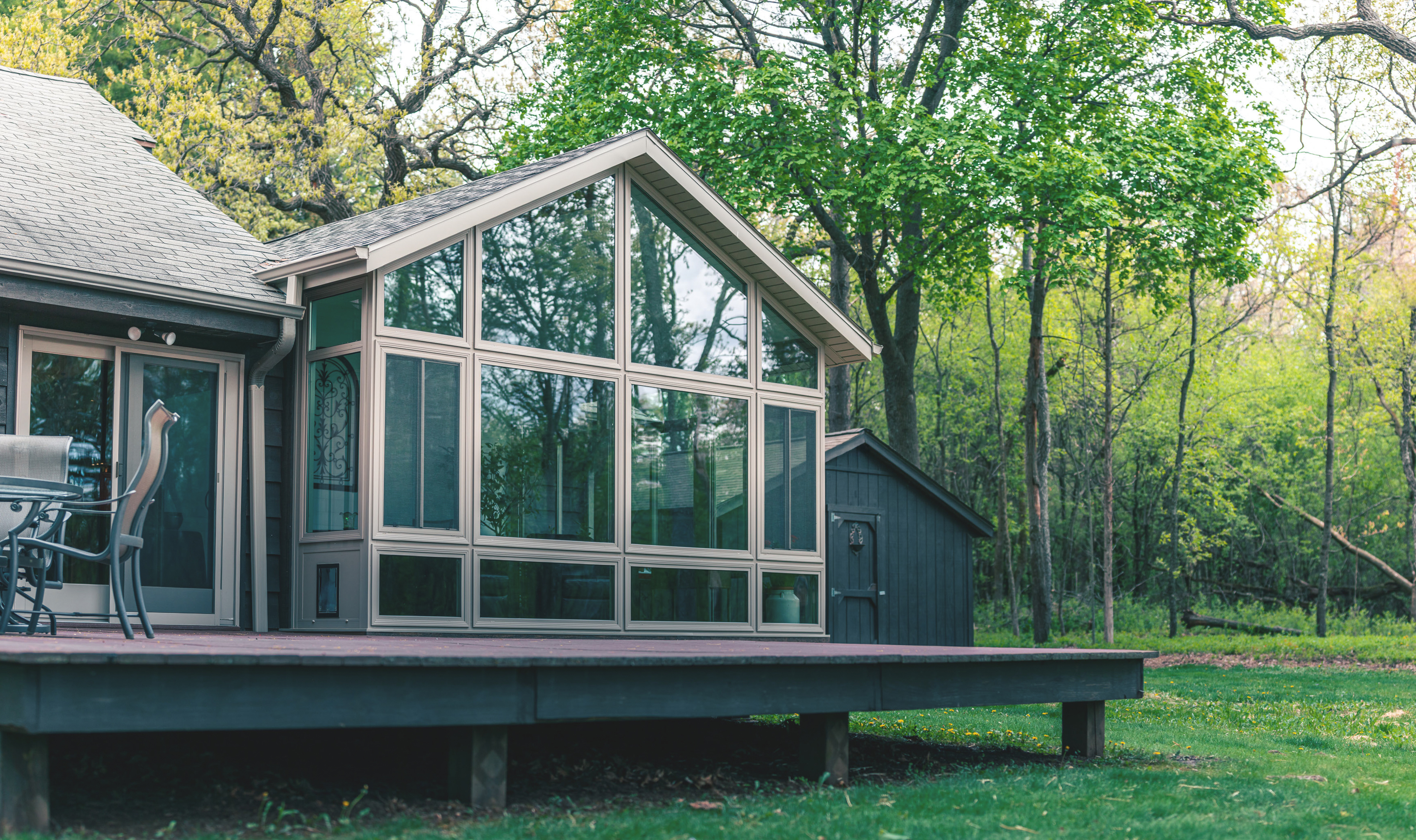 Living space sunroom with large windows