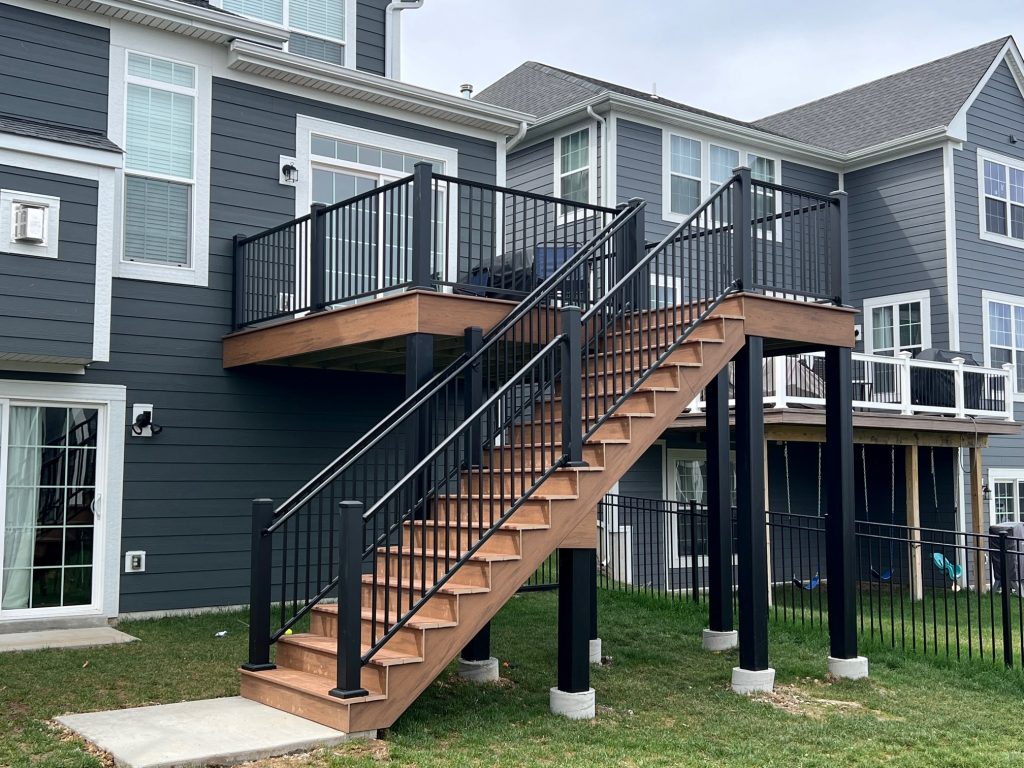 Brown deck with black railings