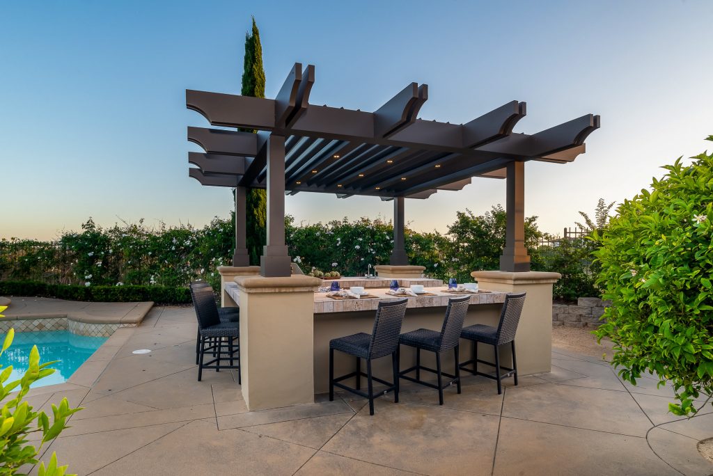 louvered roof above a dining dark area