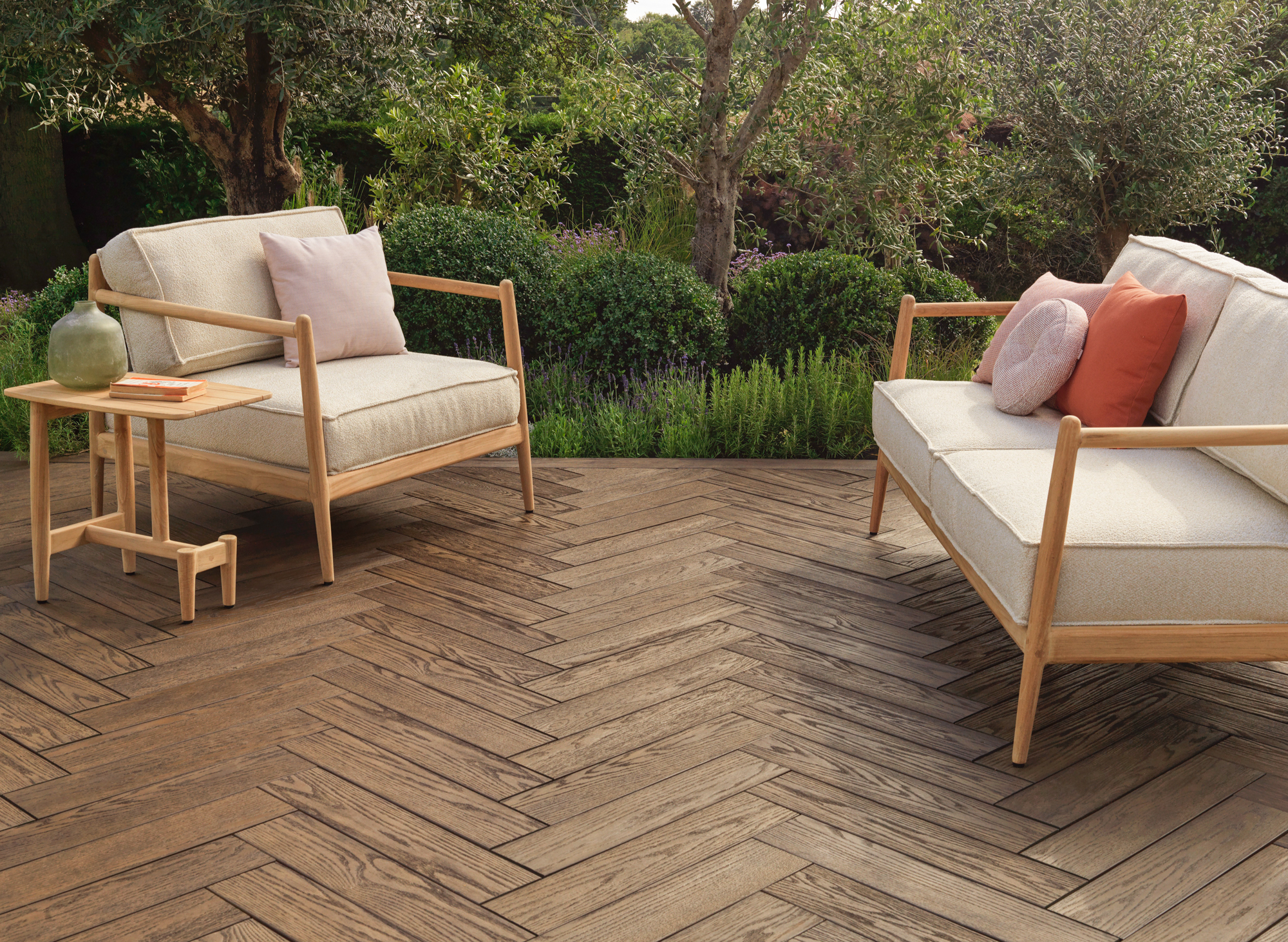 Chevron golden oak millboard decking in outdoor living space