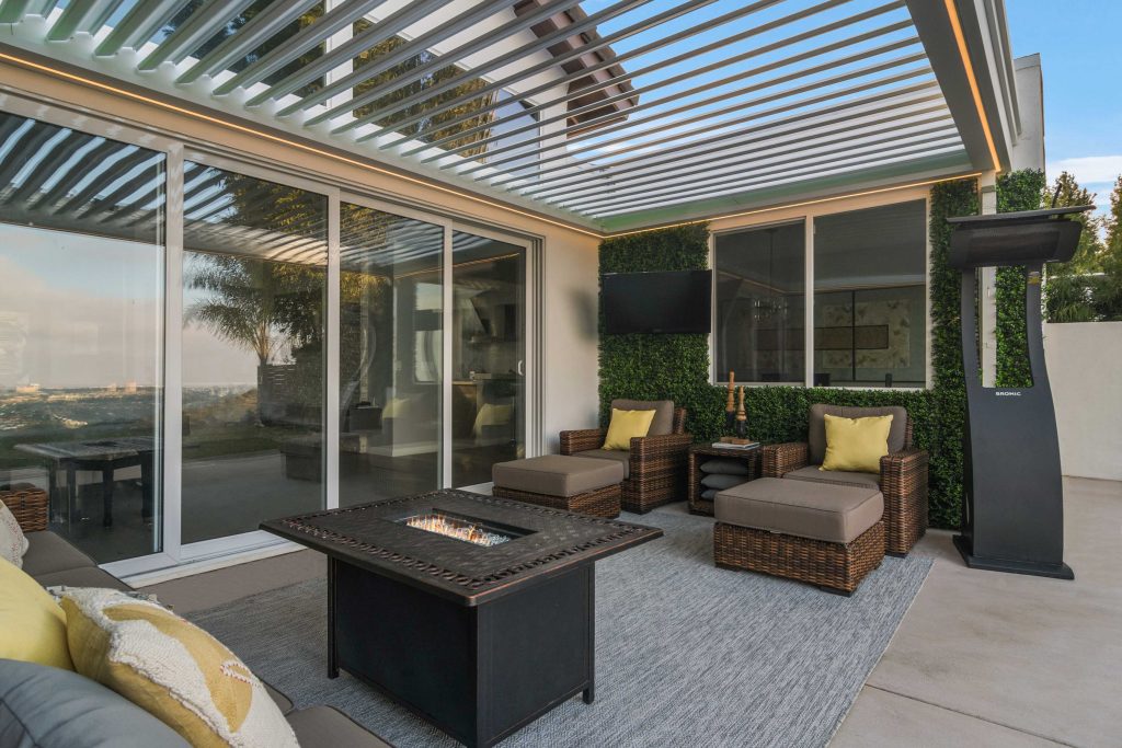 Louvered roof above outdoor living space