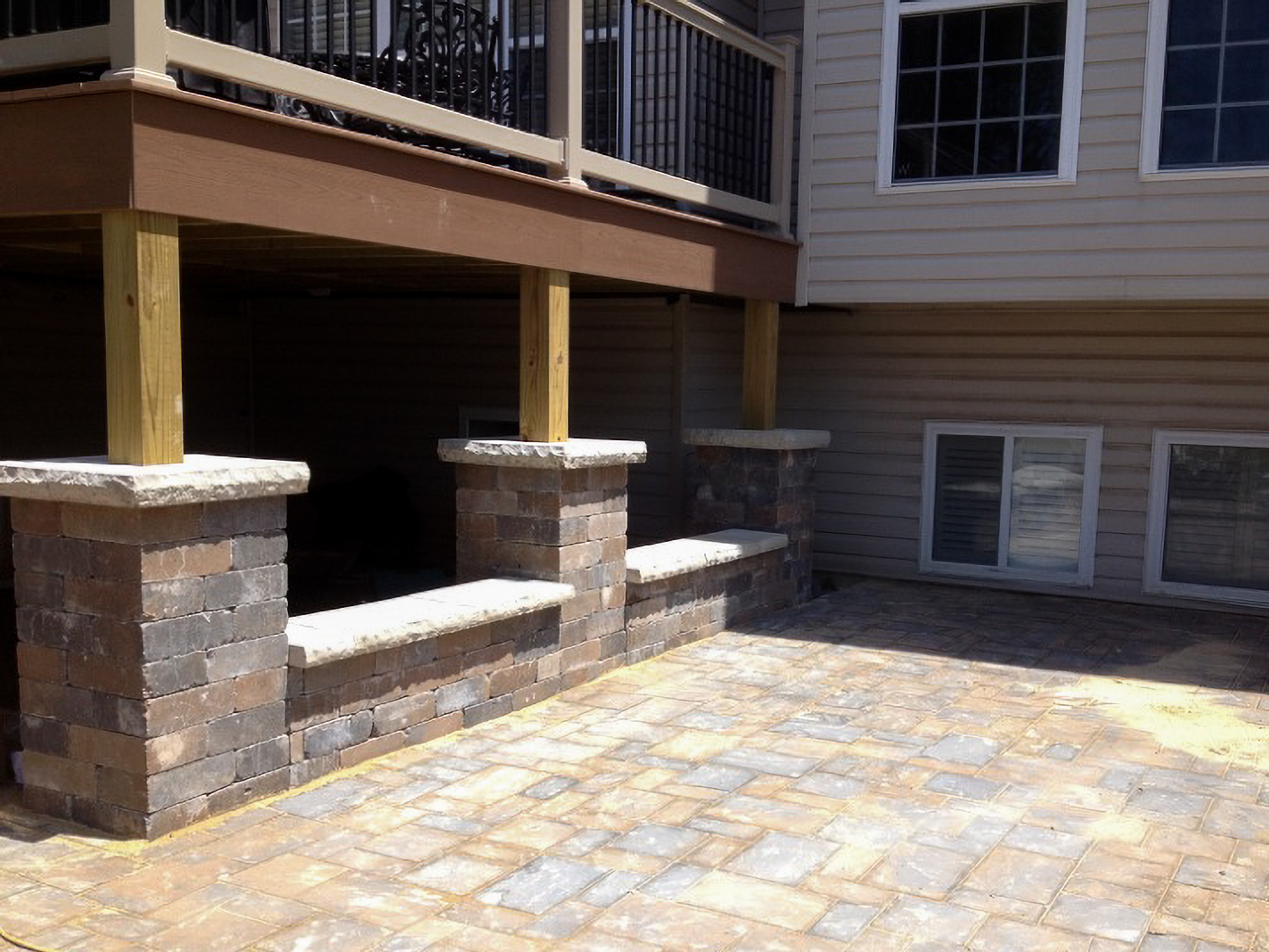 Patio paver with paver deck posts