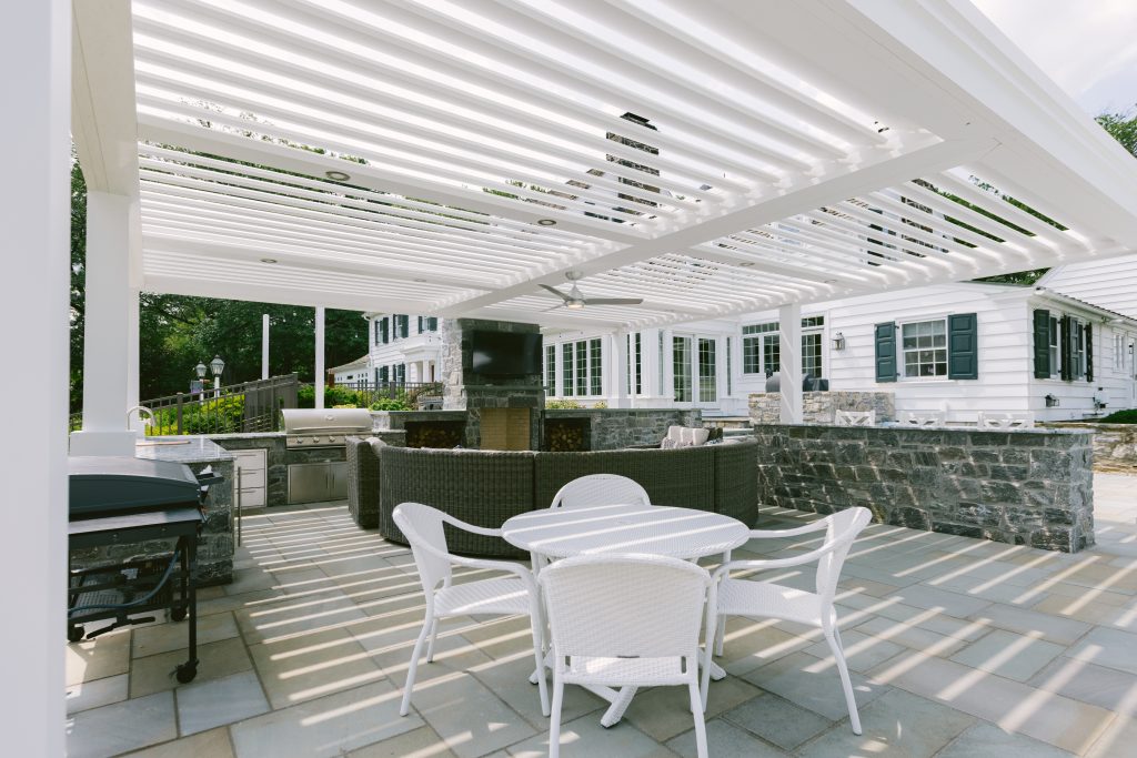 Luxurious Louvered roof in outdoor cooking and dining area