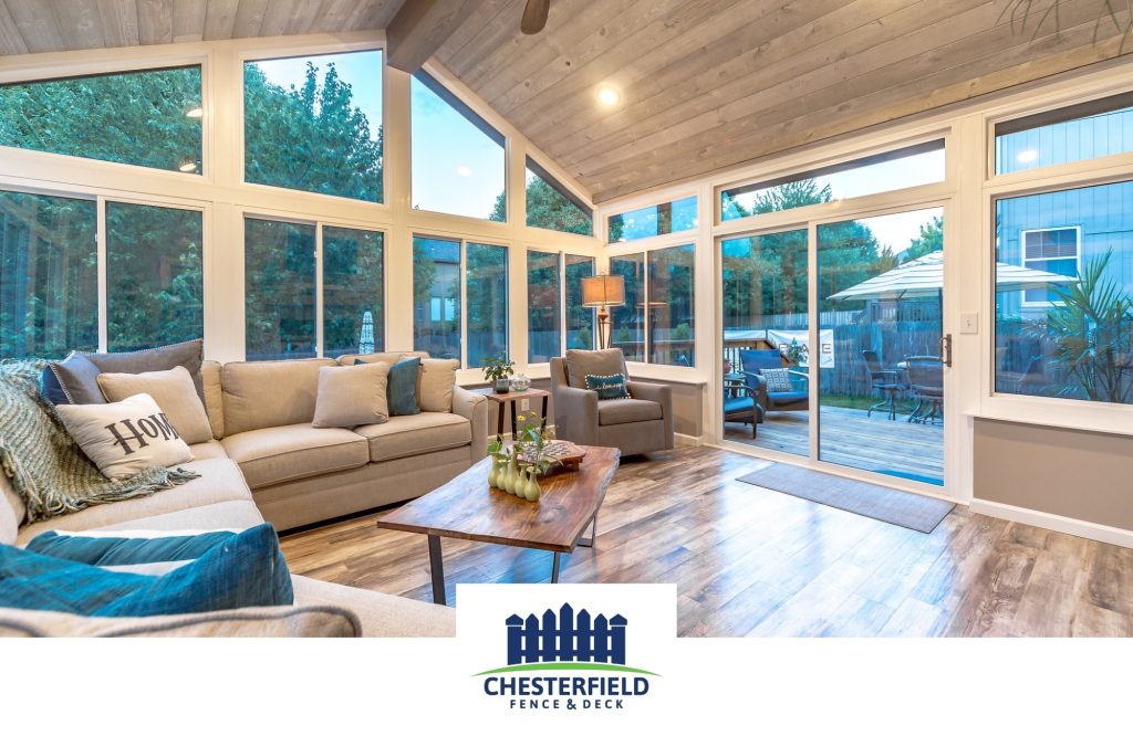 Sunroom with wood ceiling and floor